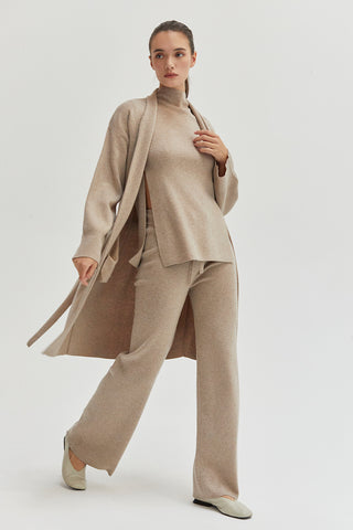 A woman wearing a cashmere blend lounge cardigan set.