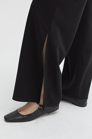 A side slit on the pants.